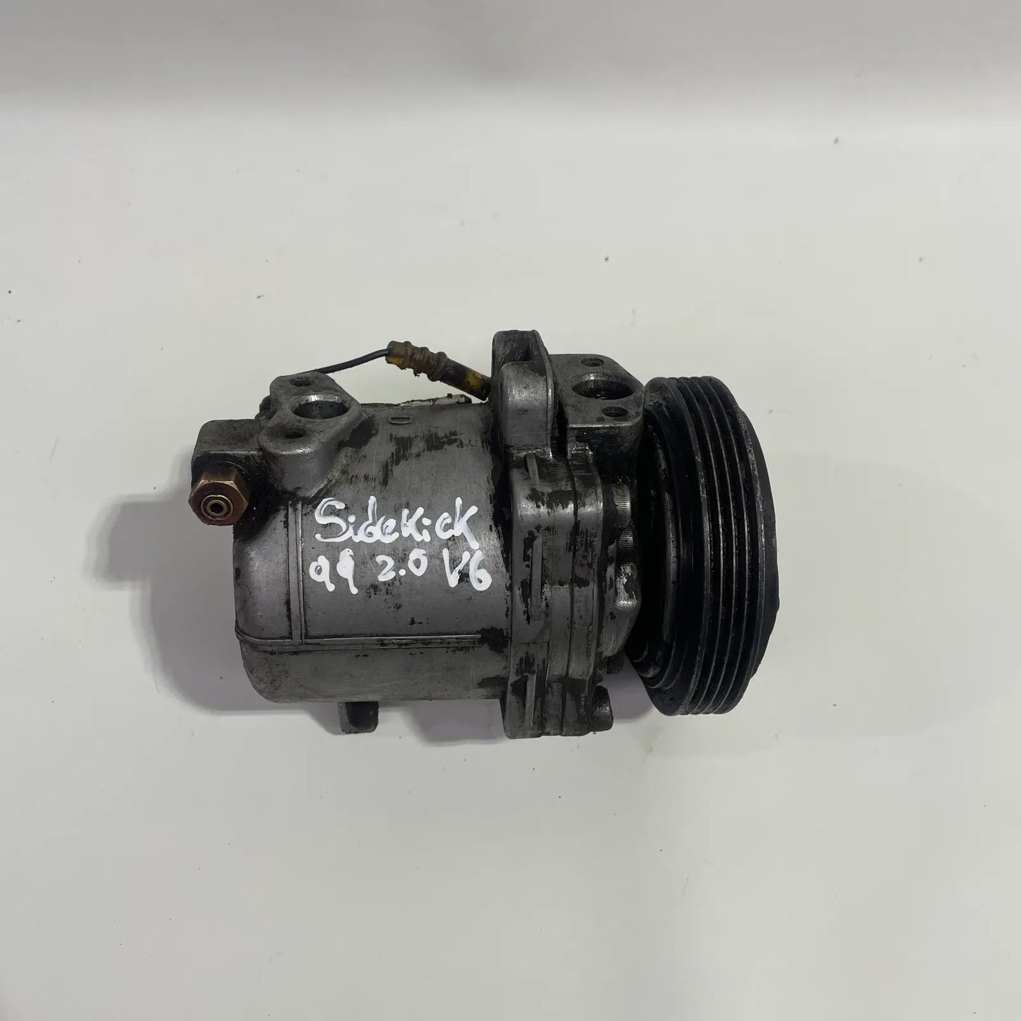 COMPRESOR A/C Suzuki SIDEKICK 1999 - 2.0 4x4 Bencina Mecánico