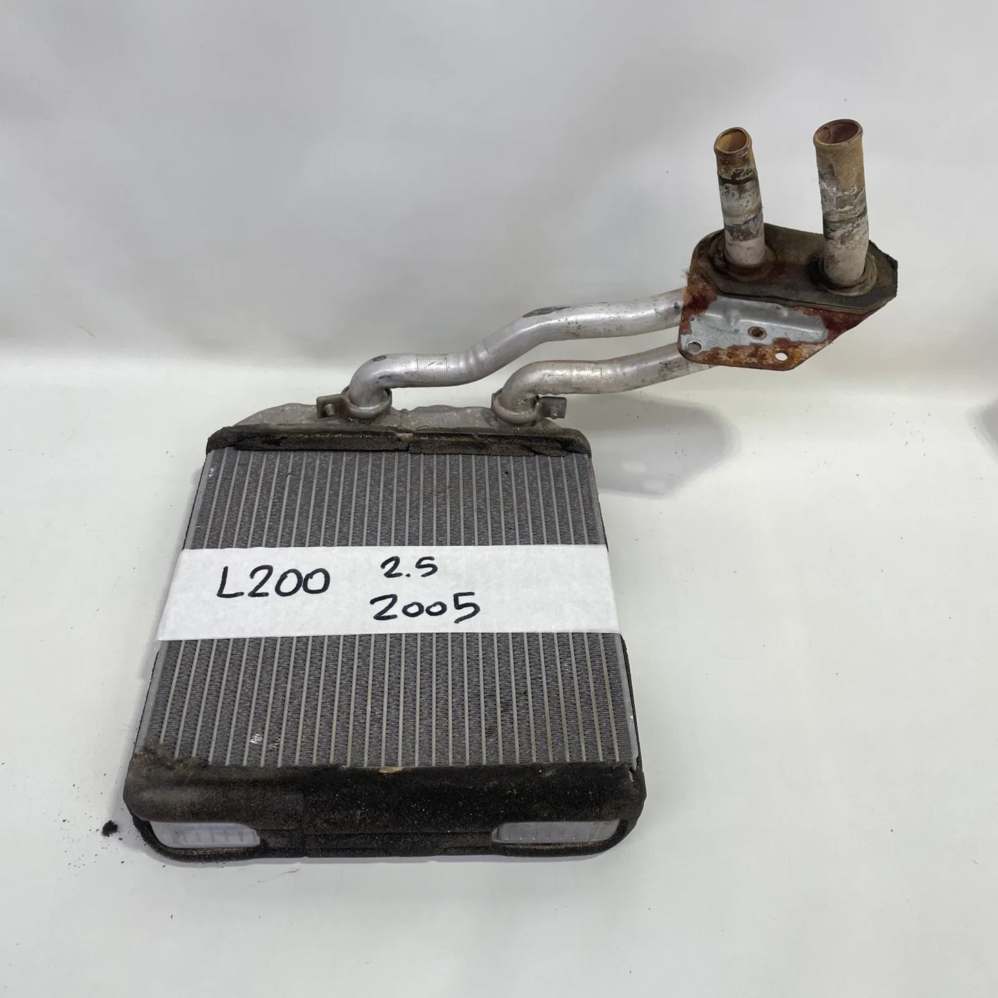 RADIADOR CALEFACCION Mitsubishi L200 2005 - 2.5 4x4 Diesel Mecánico