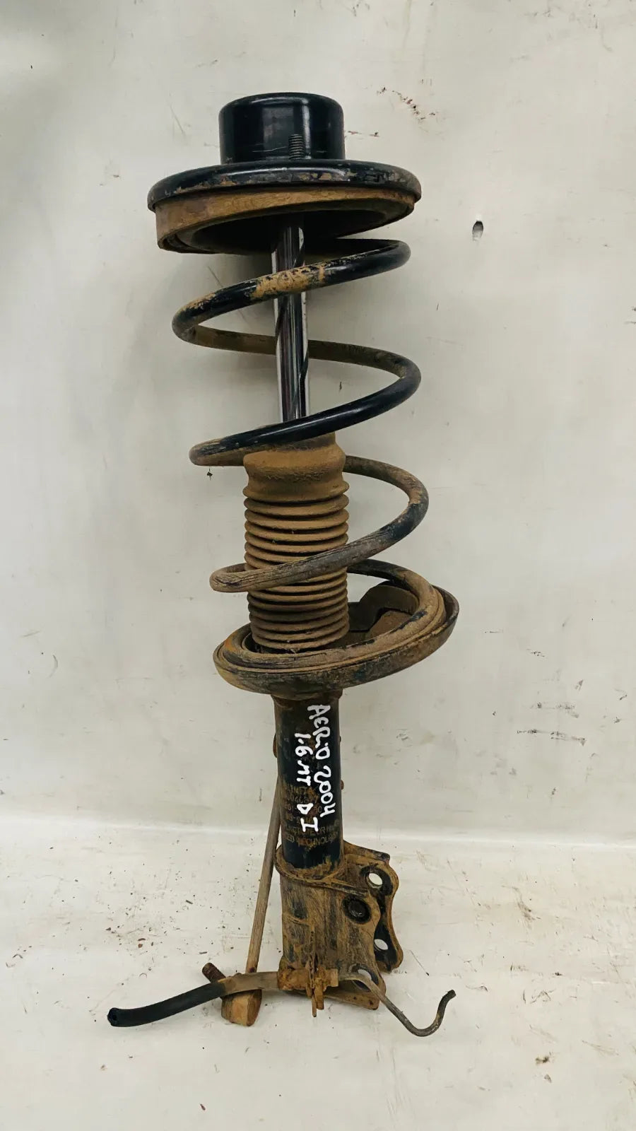 AMORTIGUADOR DEL-IZQ Suzuki Aerio 2004 - 1.6 Bencina