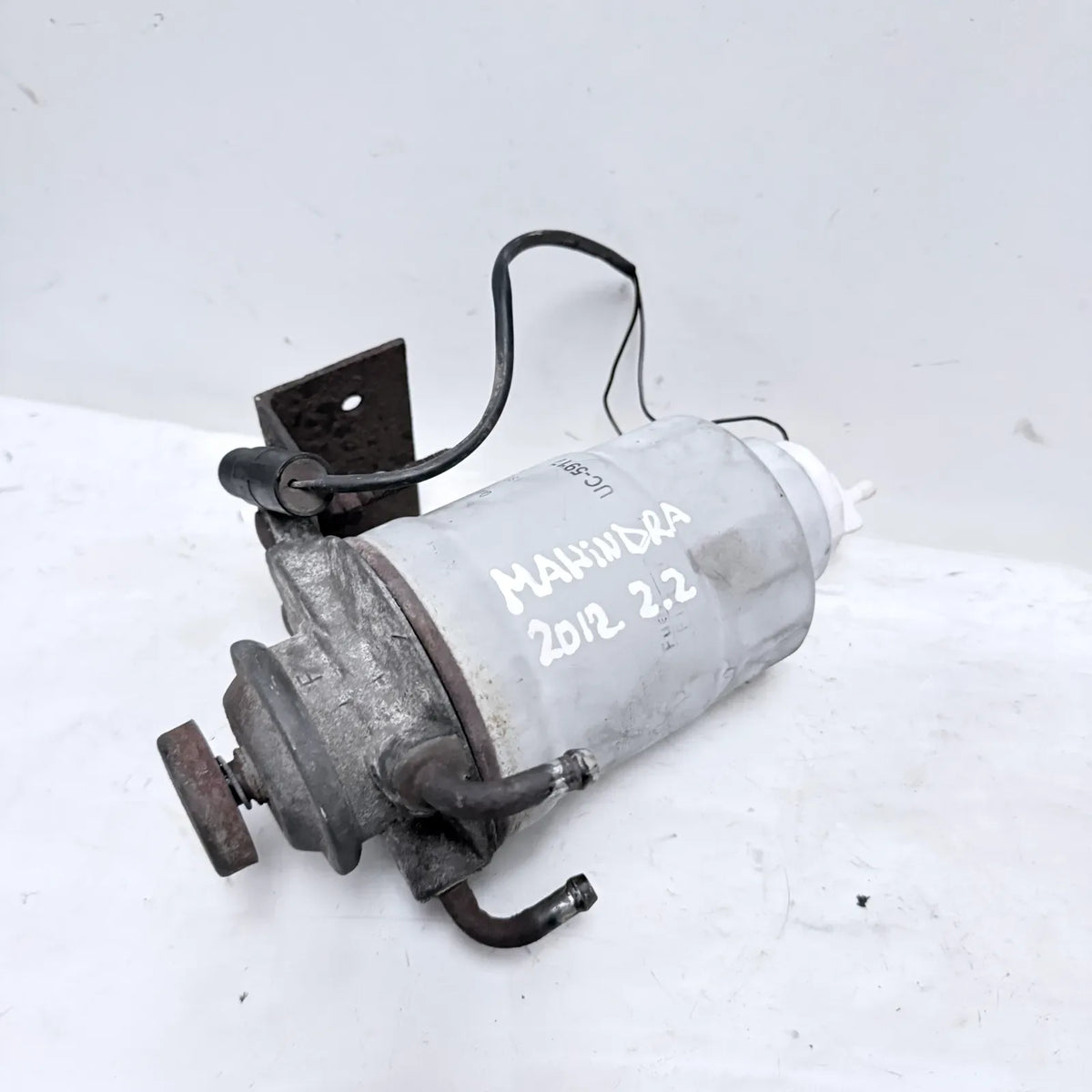 PORTAFILTRO DE COMBUSTIBLE Mahindra Pickup 2012 - 2.2 4x2 Diesel Mecánico