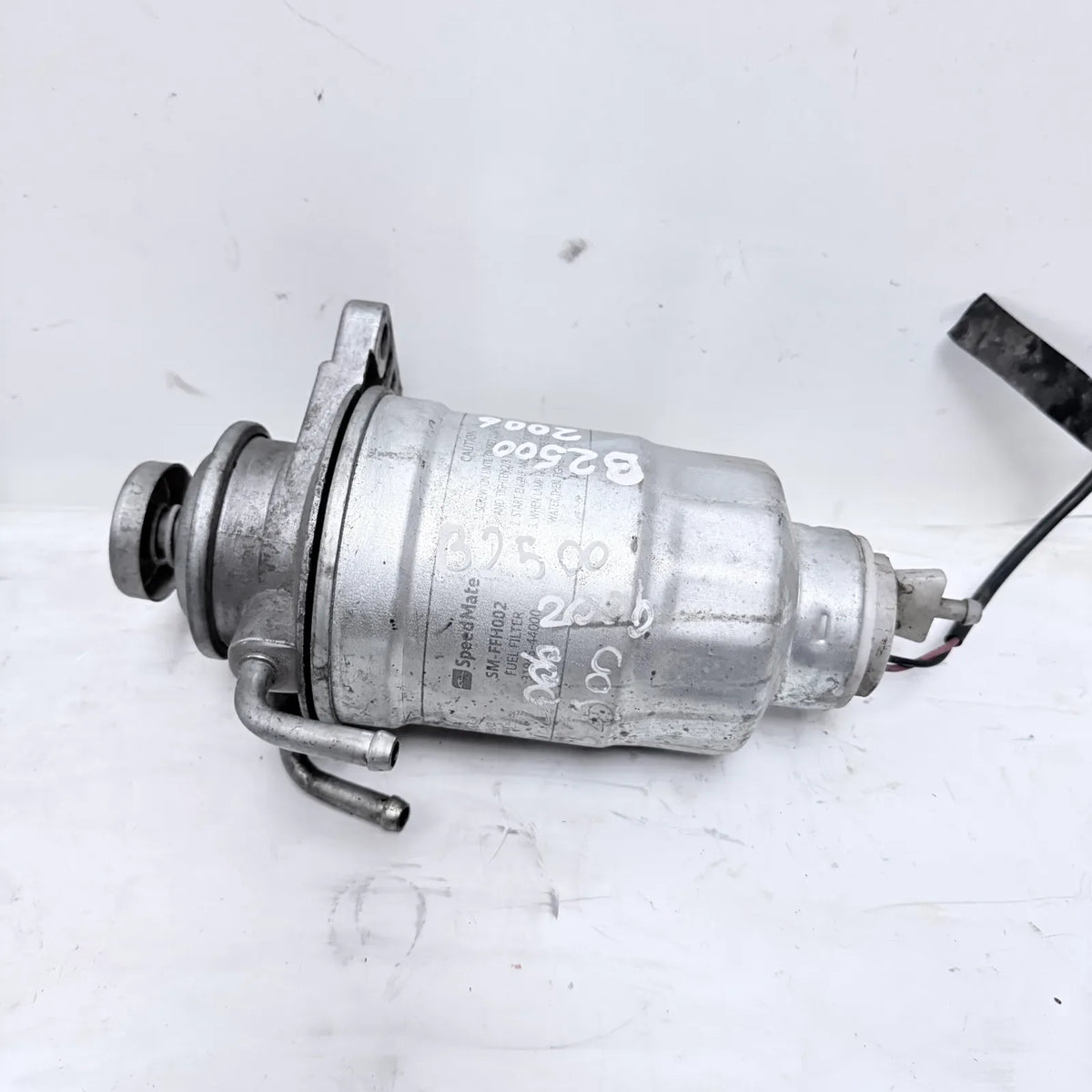 PORTAFILTRO DE COMBUSTIBLE Mazda B2500 2006 - 2.5 4x2 Diesel Mecánico