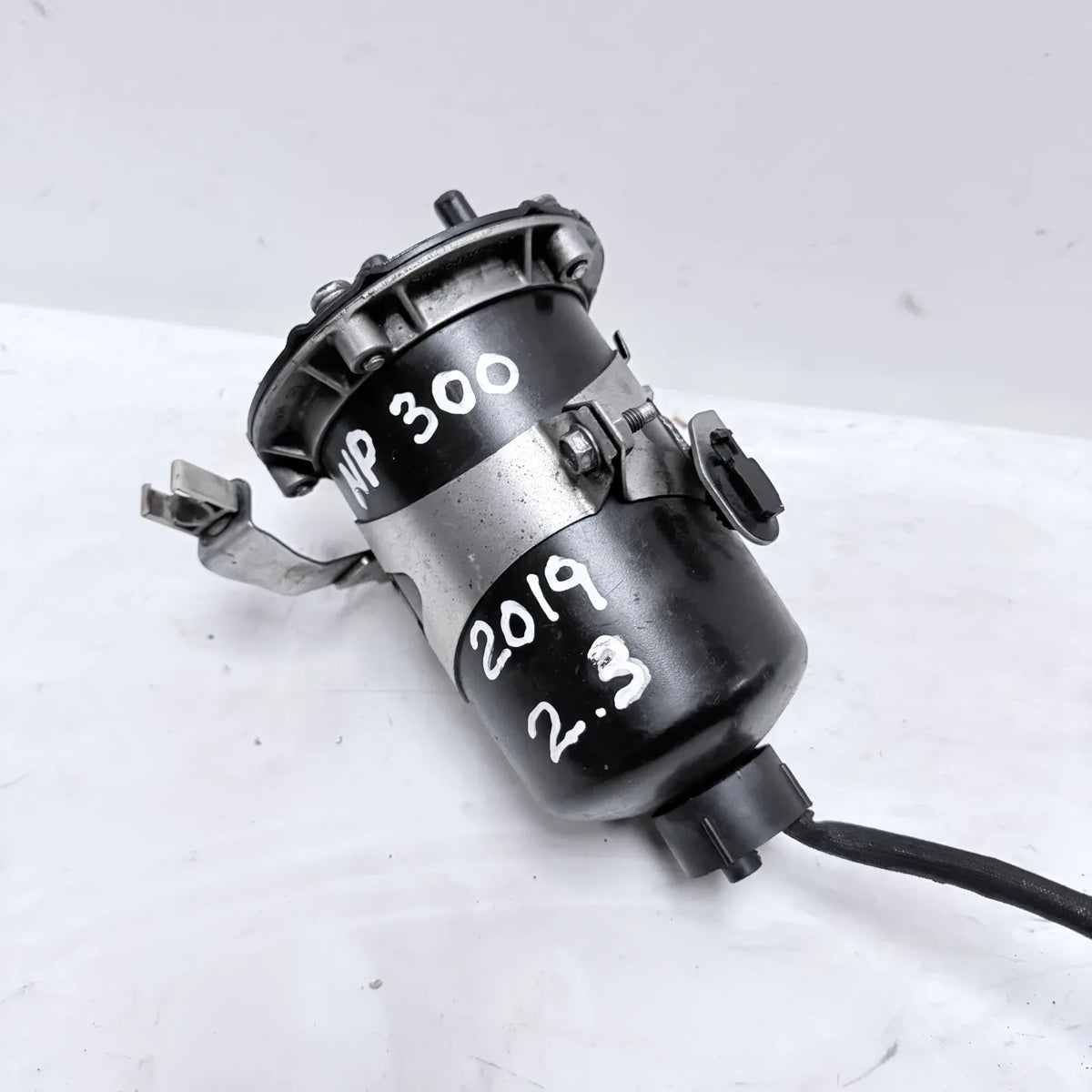 PORTAFILTRO DE COMBUSTIBLE Nissan NP300 2019 - 2.3 4x2 Diesel Mecánico