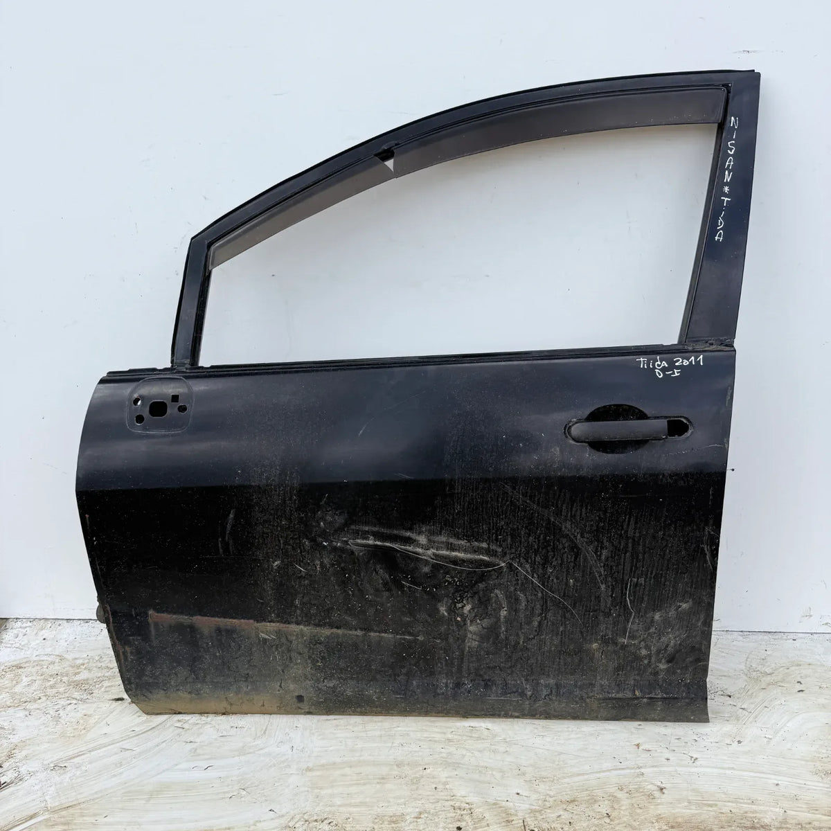 Puerta lata DELANTERA IZQUIERDA Nissan Tiida 2011 - 4x2 Bencina Mecánico