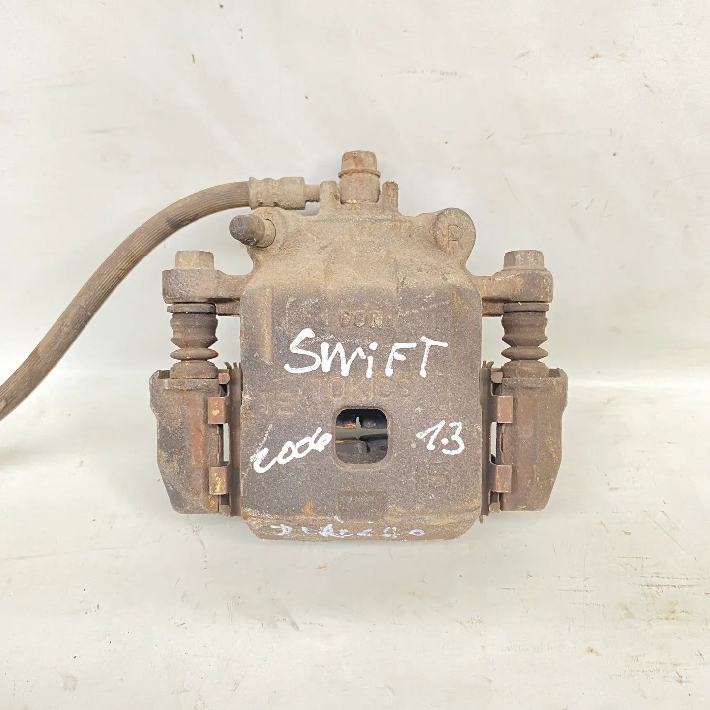 CALIPER DEL-DER Suzuki Swift 2006 - 1.3 4x2 Bencina Mecánico