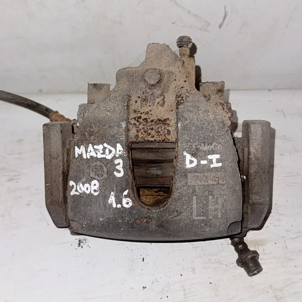 CALIPER DEL-IZQ Mazda 3 2008 - 1.6 4x2 Bencina Mecánico
