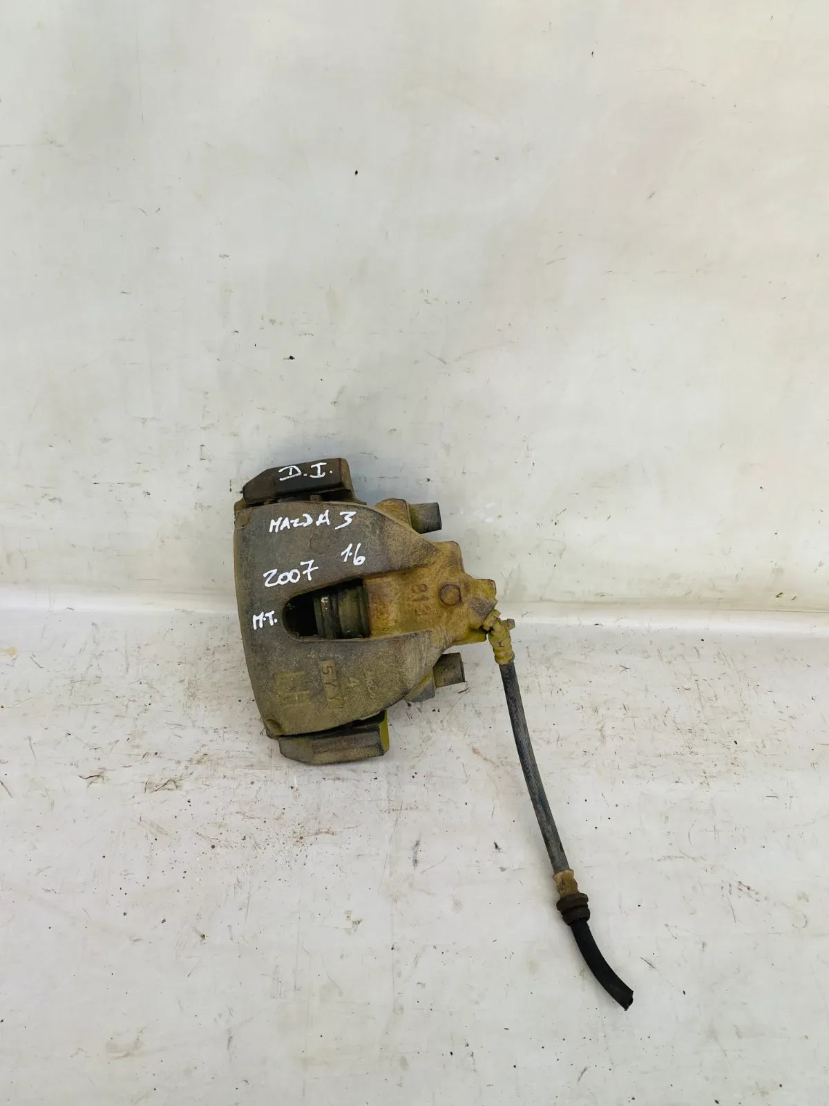CALIPER DEL-IZQ Mazda 3 2007 - 1.6 4x2 Bencina Mecánico