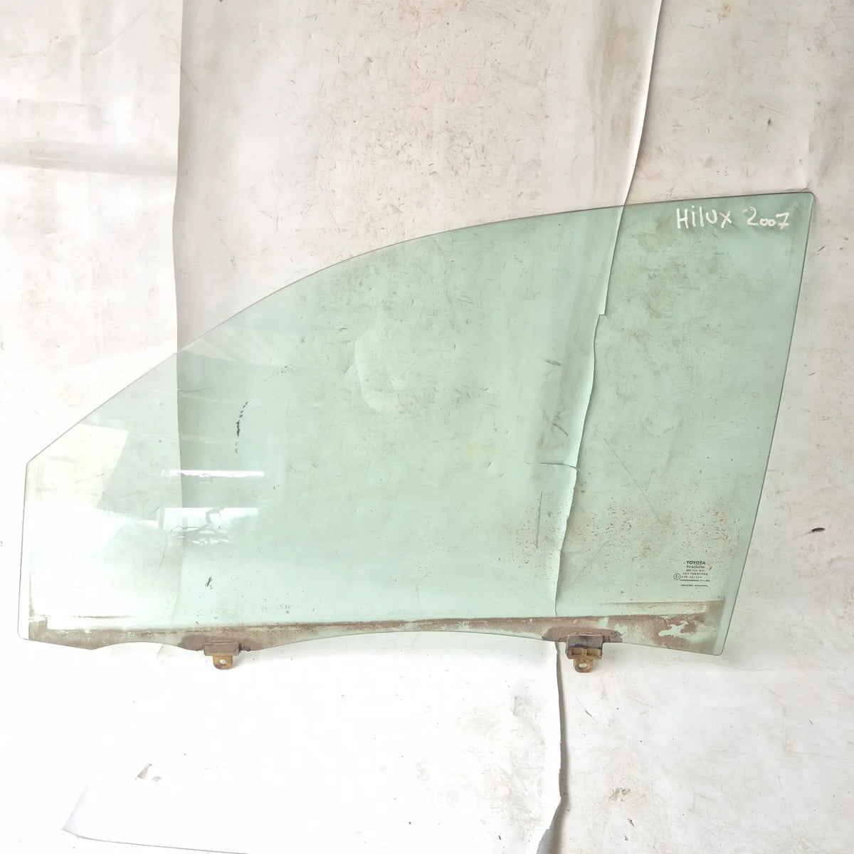 Vidrio puerta DEL-IZQ Toyota Hilux 2007 - 4x2 Bencina Mecánico