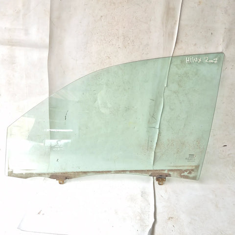 Vidrio puerta DEL-IZQ Toyota Hilux 2007 - 4x2 Bencina Mecánico