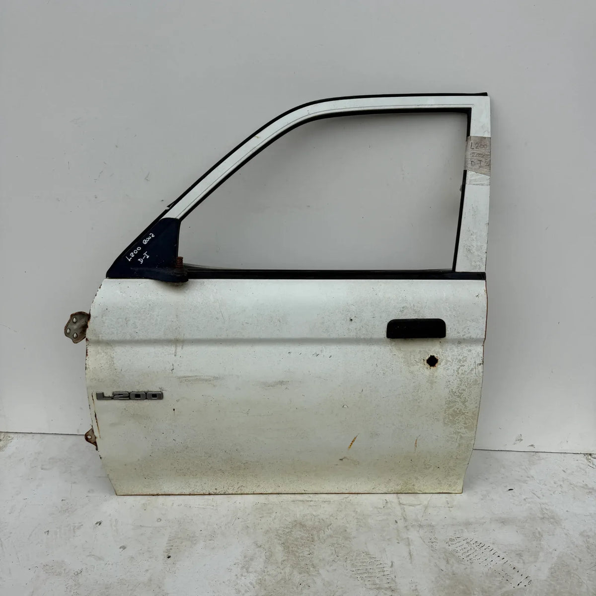 Puerta lata DELANTERA IZQUIERDA Mitsubishi L200 2002 - 4x2 Bencina Mecánico