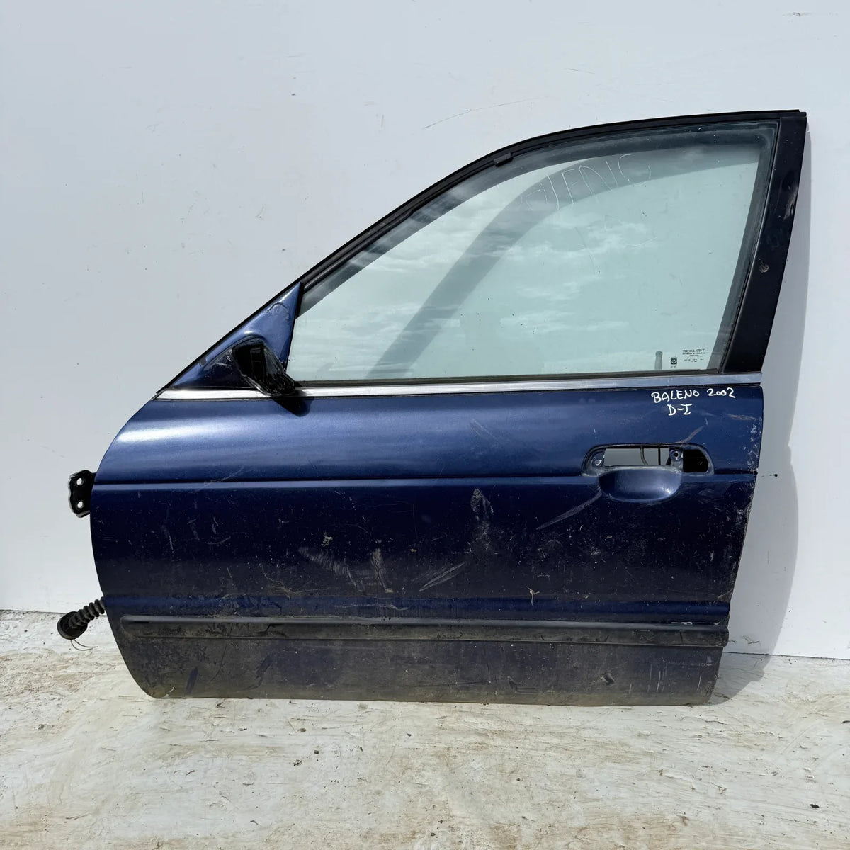 Puerta lata DELANTERA IZQUIERDA Suzuki Baleno 2002 - 4x2 Bencina Mecánico