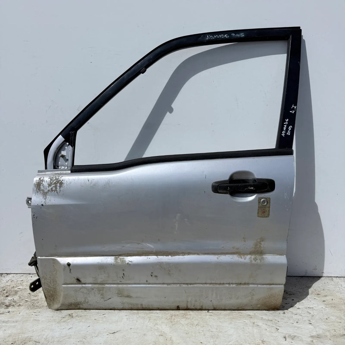 Puerta lata DELANTERA IZQUIERDA Suzuki Nomade 2005 - 4x2 Bencina Mecánico