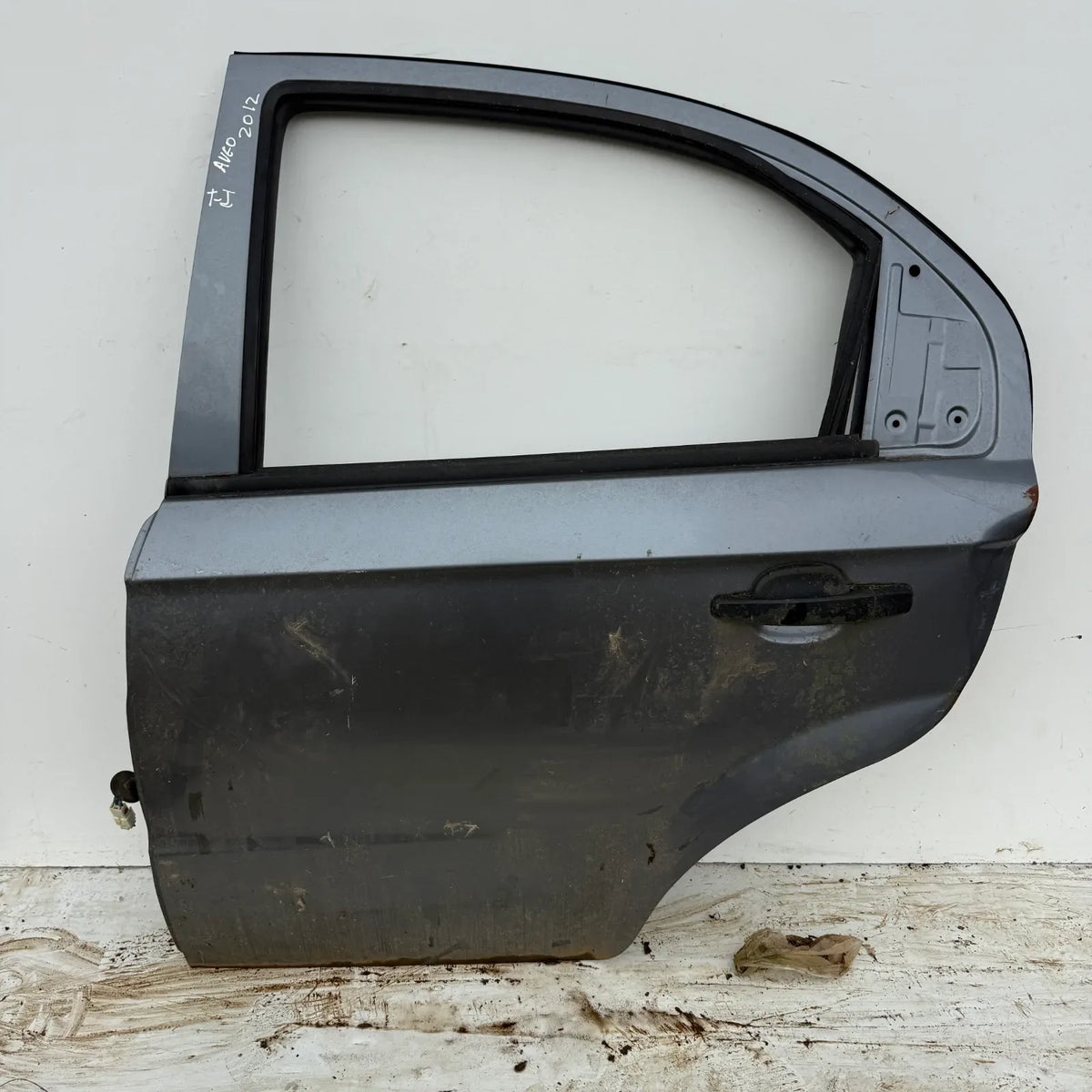Puerta lata TRASERA IZQUIERDA Chevrolet Aveo 2012 - 4x2 Bencina Mecánico