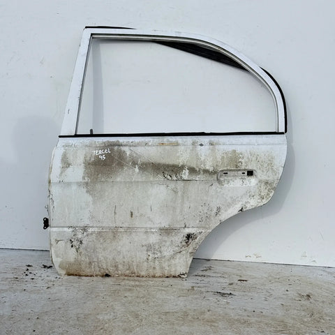 Puerta lata TRASERA IZQUIERDA Toyota Tercel 1995 - 4x2 Bencina Mecánico