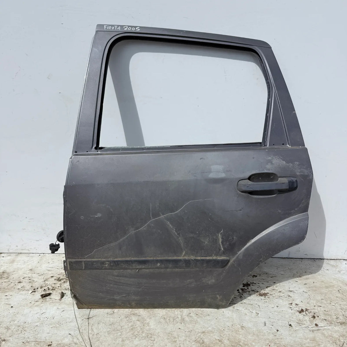 Puerta lata TRASERA IZQUIERDA Ford Fiesta 2005 - 4x2 Bencina Mecánico