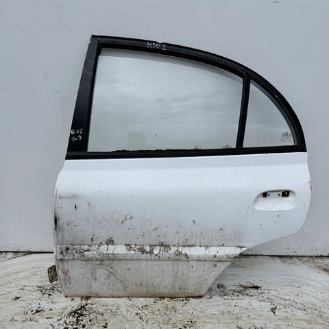 Puerta lata TRASERA IZQUIERDA Kia Rio 2 2003 - 4x2 Bencina Mecánico