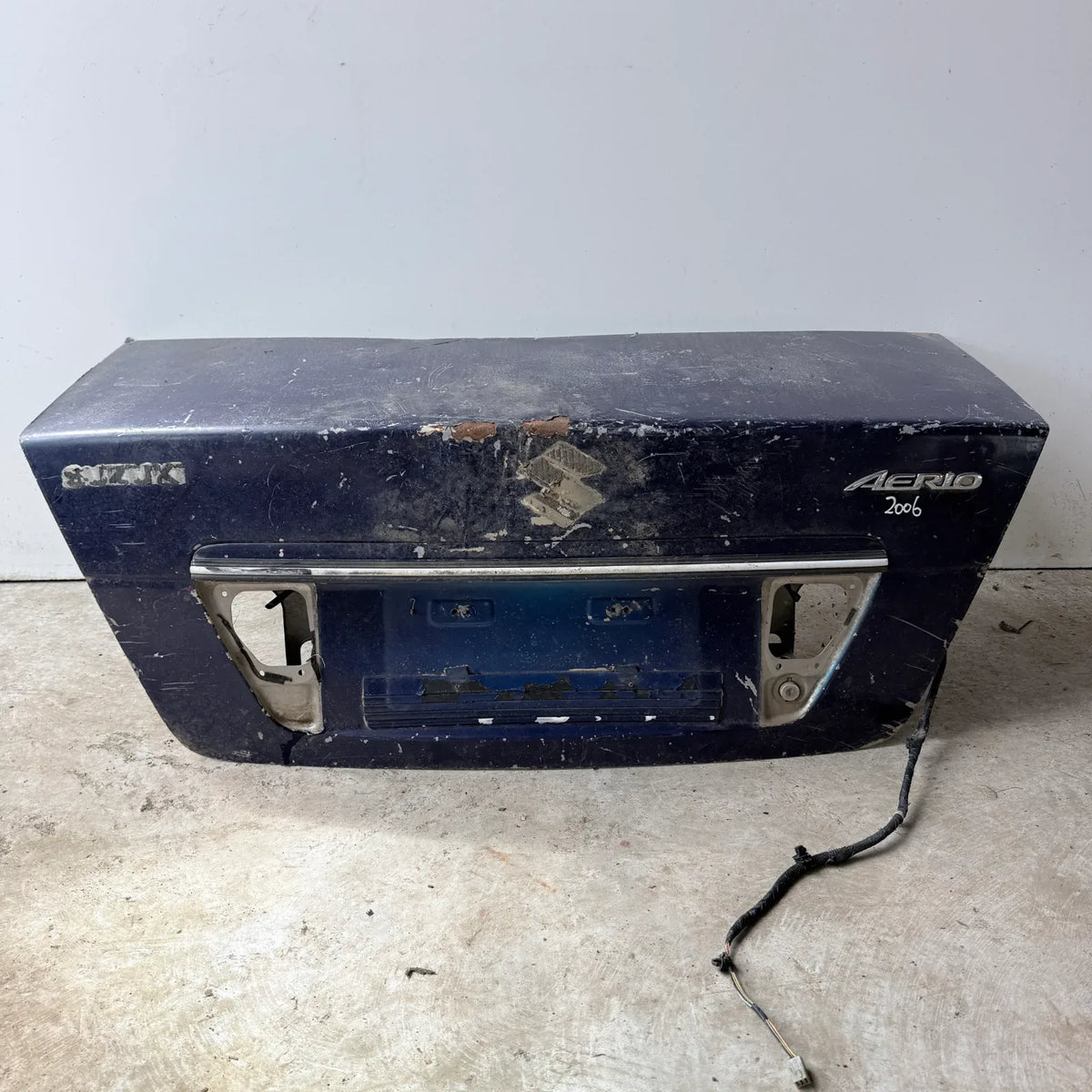 TAPA MALETA Suzuki Aerio  2006 - 4x2 Bencina Mecánico