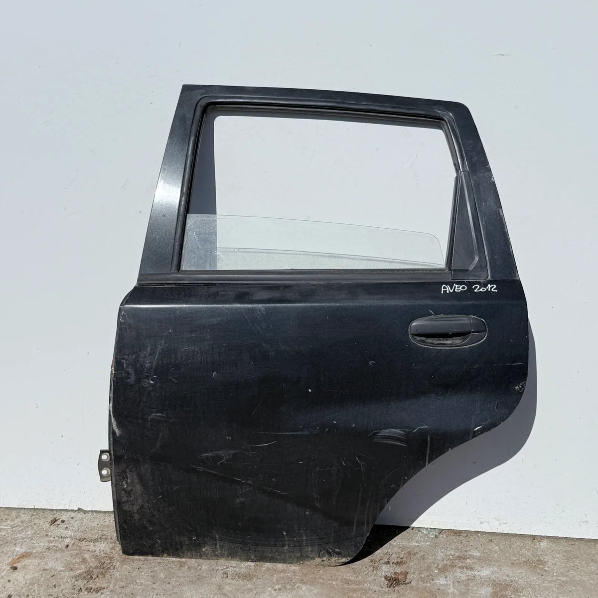 Puerta lata TRASERA IZQUIERDA Chevrolet Aveo 2012 - 4x2 Bencina Mecánico