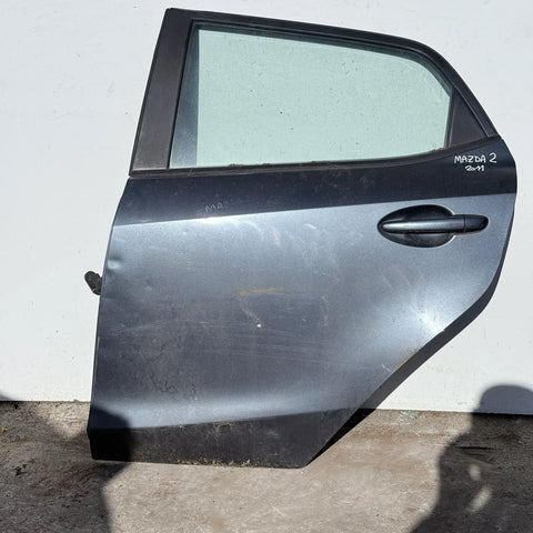Puerta lata TRASERA IZQUIERDA Mazda 2 2011 - 4x2 Bencina Mecánico